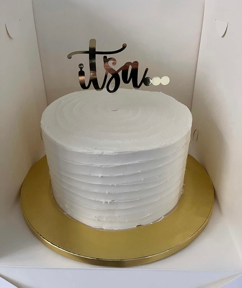 It’s a… cake topper, Gender reveal cake topper